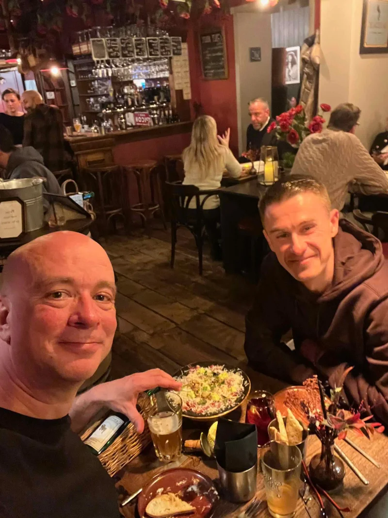 Me and Robby, evaluating which restaurant is good enough to recommend my guests during their stay in Bruges